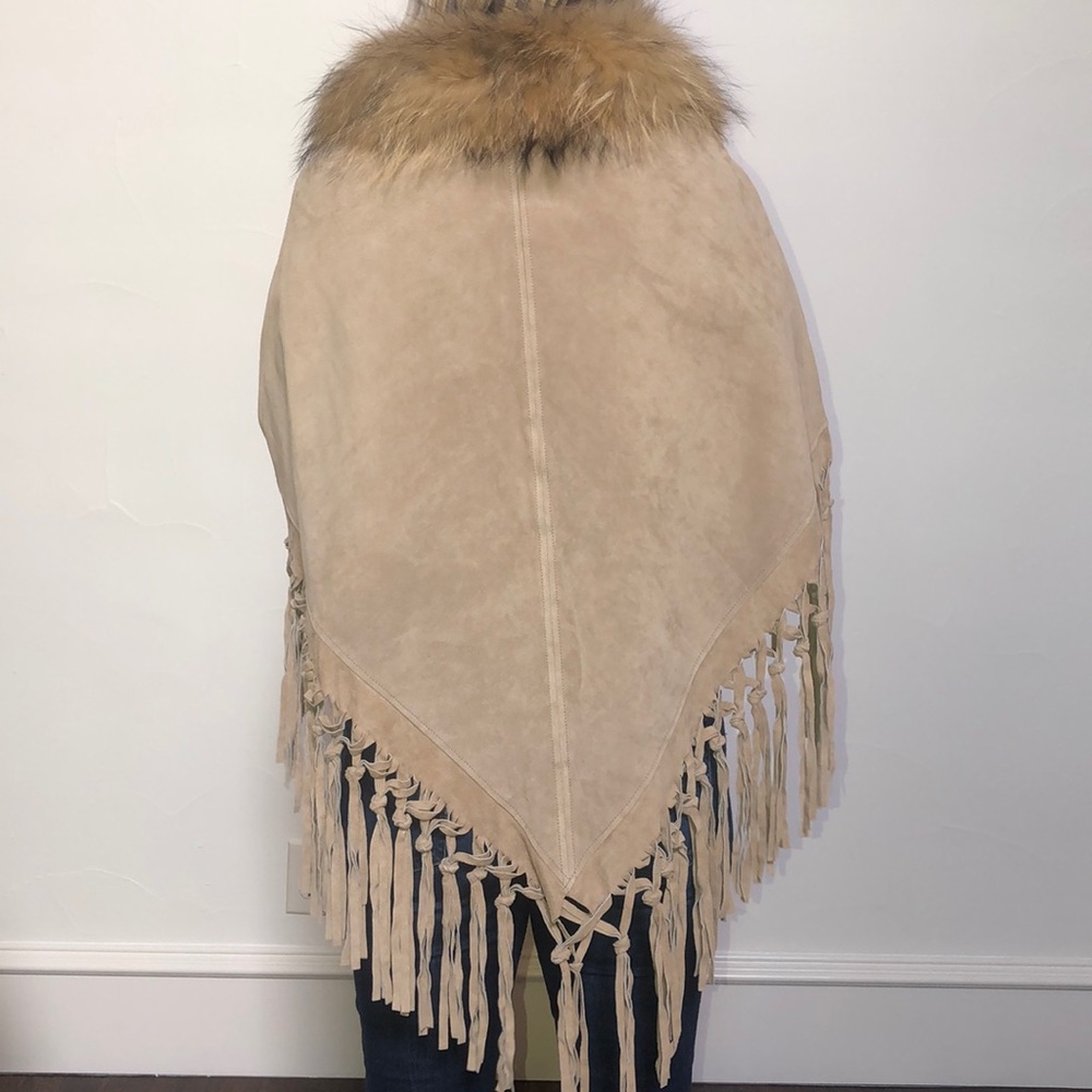 Dana Stein, leather fringe poncho.